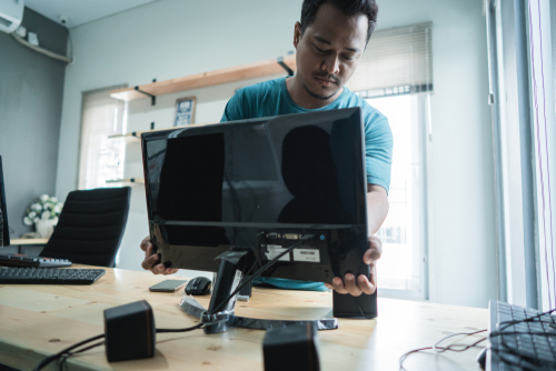 man setting up computer LG-Networks